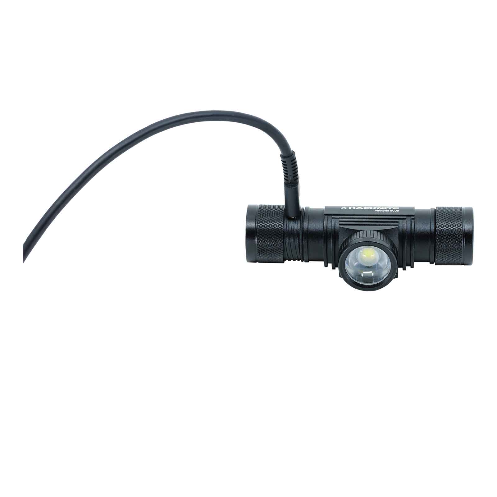 Vue sur la lampe frontale Photoris 500R sans bandeau, en cours de chargement.