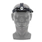 Vue de face de la lampe frontale Noctila 600R, sur une tête en plastique.